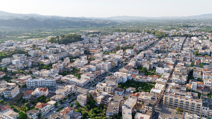 Fototapeta premium Aerial panoramic view of Sparta city with Taygetus mountains and ancient ruins remains in Peloponnese, Greece