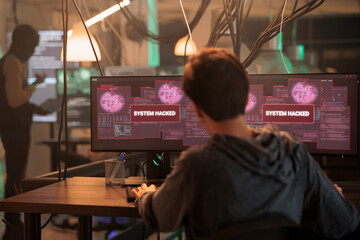 Criminal hacking computer system password, stealing finances, sending virus, cybercrime. Cyberattack, woman creating malicious software, breaking into database server at night time