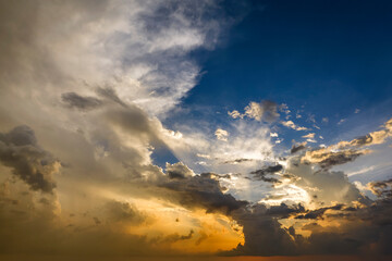 Amazing evening skyscape. Sunset sky with bright colorful clouds