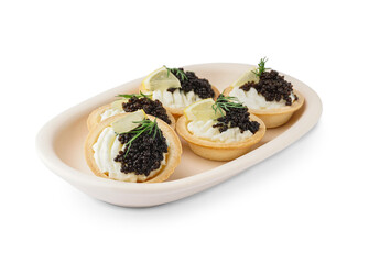 Bowl of tasty tartlets with black caviar on white background
