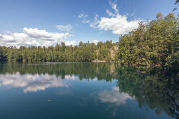 long exposure reflection of trees in lake. Karelia, Russia.