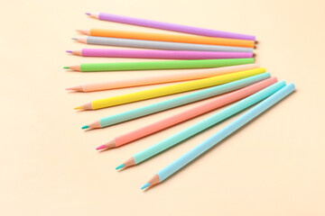 Bright pencils on color background