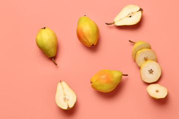 Fresh pears on red background