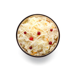 Bowl with delicious sauerkraut and viburnum on white background