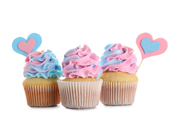 Delicious cupcakes with blue and pink frosting on white background. Gender reveal party concept