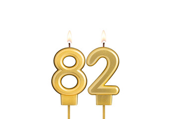 Birthday candle number 82 on white background