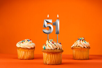 Birthday celebration in orange color - Candle number 51