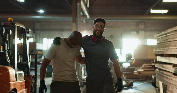Men, carpenter and workshop with teamwork high five, support and celebration for collaboration with employees. Wood work, good job and craftsman with lumber warehouse, hug and happy together