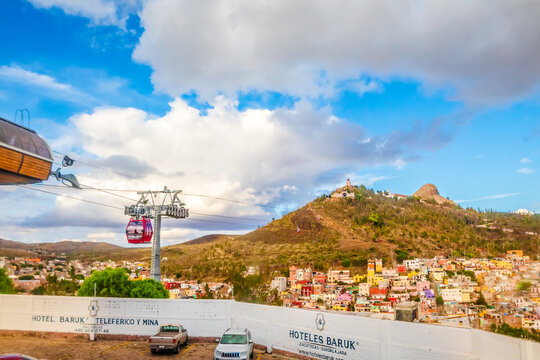 Zacatecas, Zacatecas Mexico, July 25 2023 Cerro de la bufa and cable car of Zacatecas city, sunny day with clouds, hill surrounded by houses