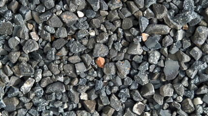 A pile of rocks with small black object in the middle