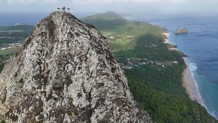Aerial photo taken with drone ofMorro do Pico and Dois Irmãos n Fernando de Noronha at sunrise