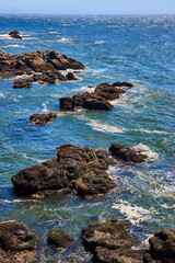 Rugged Rocky Shoreline with Crashing Waves Aerial Perspective