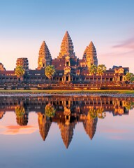 Obraz premium Reflection of Angkor Wat in the water during sunrise, Angkor Wat, temple complexes