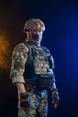Portrait of a Tactical Soldier in Combat Gear against an Intense Orange and Blue Background