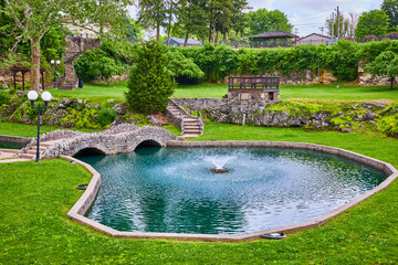 Ornamental Pond and Stone Bridge in Huntington Sunken Gardens Eye-Level View