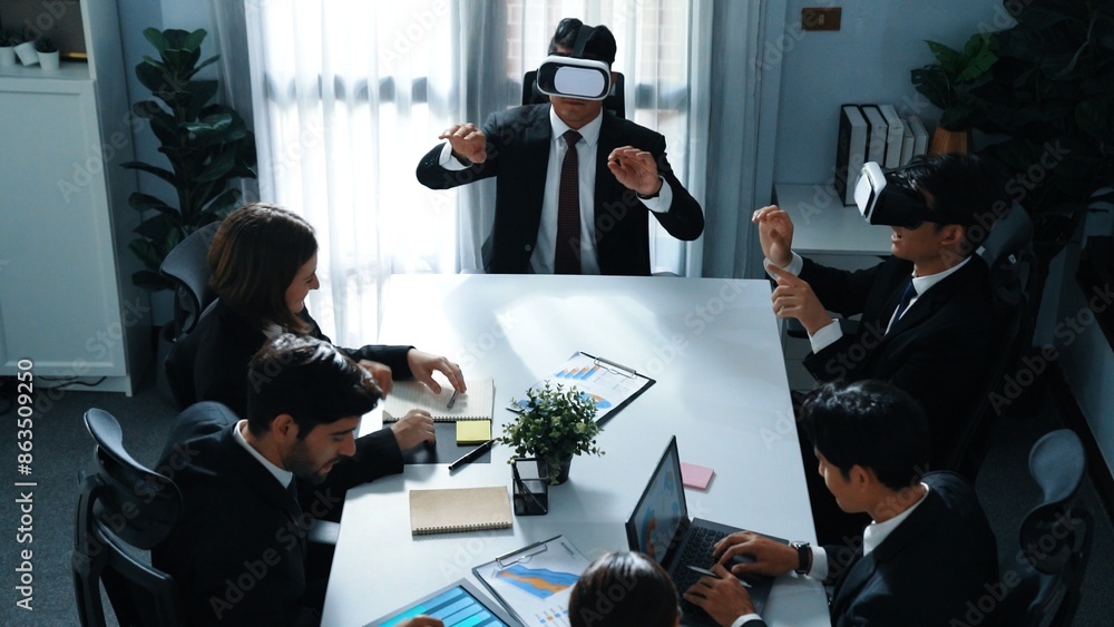 Poster top view of manager working on laptop and sending data analysis to business people by using vr glass