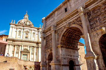 roman forum arch with dome in back sunny