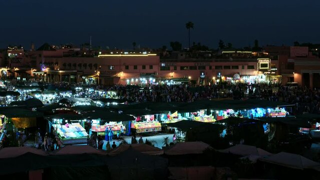 Marrakech - Morocco: Jamaa el Fna Souk square by night offers incredible shopping experience. Imperial old fortified city packed with vendors and their stalls. This medina is UNESCO WHS