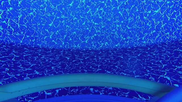 First-Person POV of Automatic Pool Cleaner Robot Vacuum Underwater