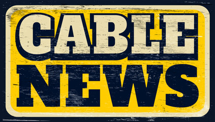 Aged and worn cable news sign on wood