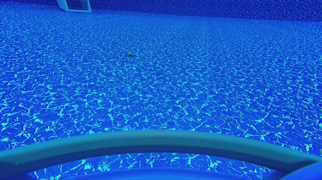 First-Person POV of Automatic Pool Cleaner Robot Vacuum Underwater