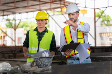 Engineer and foreman worker team inspect the construction site, Site manager and builder on construction site
