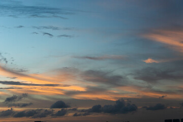 sunset over the river, skies with big clouds at sunset,