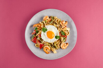 Seafood and Egg Udon in Eastern Lagman Style on Vibrant Pink Background