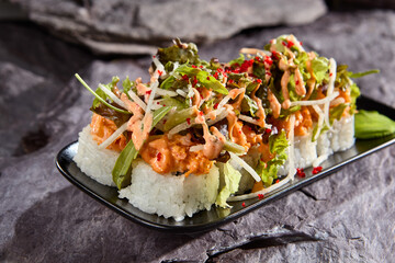Spicy Sauce Salad Roll on Rice with Fresh Greens – Sushi Fusion Cuisine