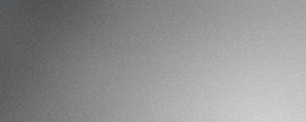 Brushed metal texture with light reflecting off of the surface creating a gradient