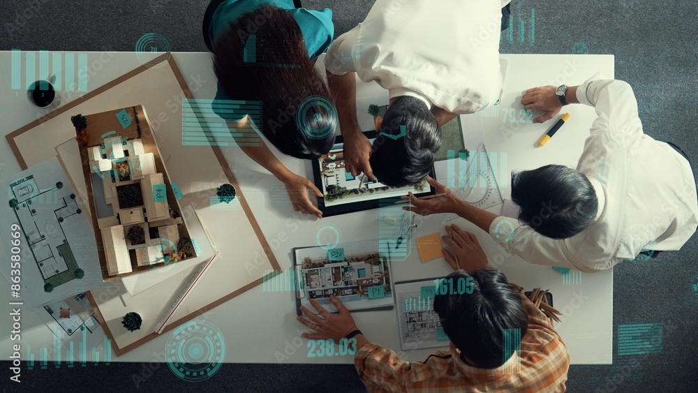 Aufkleber top down aerial view of team looking at blueprint and talking about financial chart or investment st