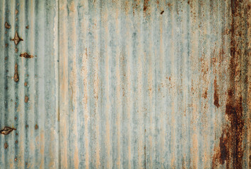 Old zinc vintage fence wall texture for background, pattern of rusty on metal panel.