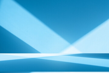 Wall interior background, studio and backdrops show products.with shadow from window color white and blue. background for text insertion and presentation product	