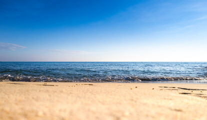 Nature of the beach and sea Summer with sunshine, sandy beaches, clear blue waters sparkling against the blue sky. On an island with good ecology and environment Background for summer vacation concept