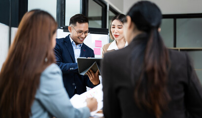 Creative teamwork and business people in office, planning and brainstorming with financial report.