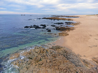 aerial drone view of a beach with a rock, zenithal photo, Portugal