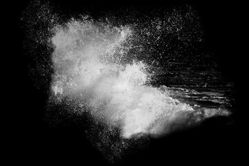 Breaking ocean wave isolated on dark background. Water splashes. Black and white illustration	