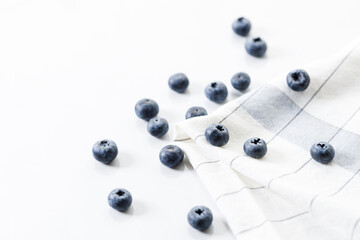 fresh berries on white marble table background. Selective focus.