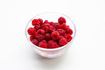 Fresh raspberry on white background.