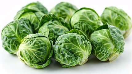 This Brassica oleracea from the Gemmifera cultivar group is ready to be cooked, eaten or used in recipes, and is pictured on a white background.