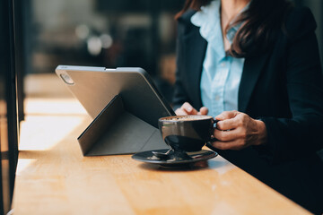 Coffee Cup on the Table with Computer Keyboard for Business Concept.