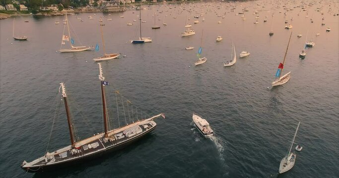 Yachts docked in the Marblehead Harbour at sunset, Marblehead, Massachusetts, United States Of America.