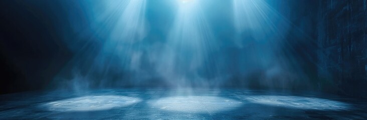 Obraz premium Dark blue background with a spotlight shining down on the floor, a misty atmosphere with smoke and fog in the air, a mysterious ambiance, an empty stage for product display.