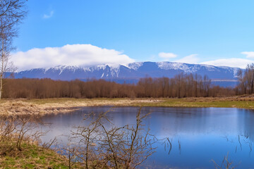 spring landscape with lake and mountain