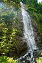 Waterfall cascade in a gorge with rocks. Kitzlochklamm in Austria.