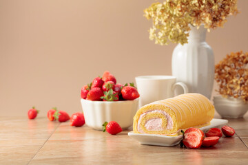 Homemade strawberry biscuit cake roll with fresh berries.