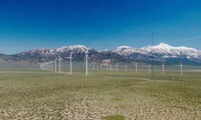 Spring Valley Wind farm in the desert countryside and mountain range. Ely, Nevada, United States of America.