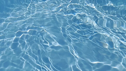 Blue water with ripples on the surface. Defocus blurred transparent blue colored clear calm water surface texture with splashes and bubbles. Water waves with shining pattern texture background.