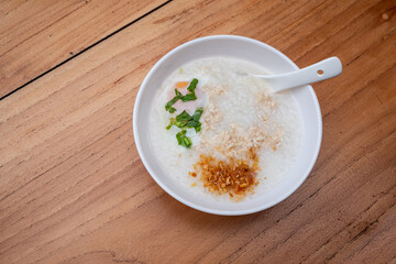 minced Chicken congee with a soft-boiled egg, a very popular breakfast dish in ASEAN