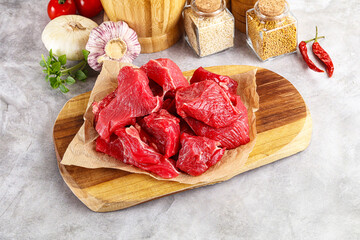 Sliced raw beef meat for cooking